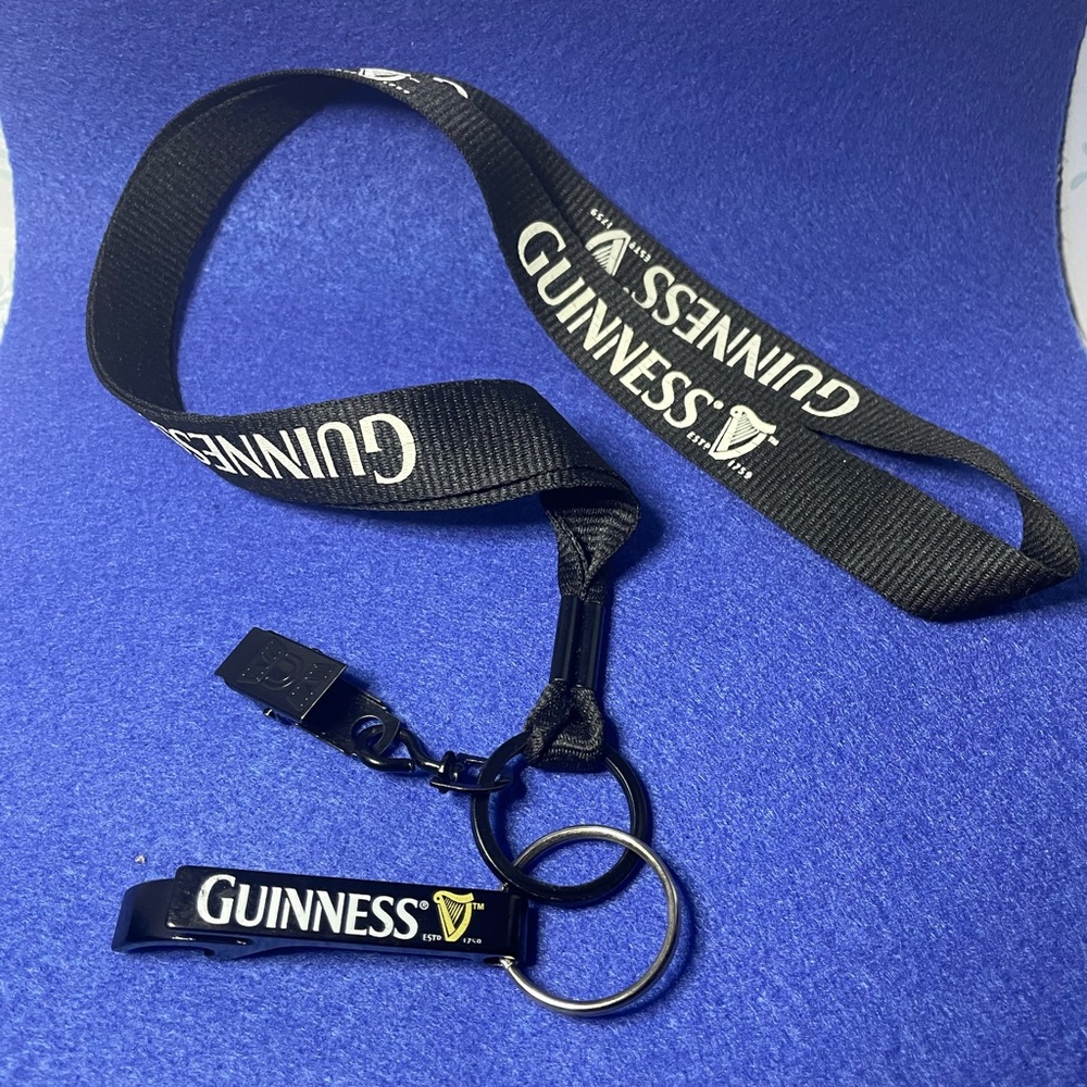 Guinness, lanyard with key ring, and bottle opener